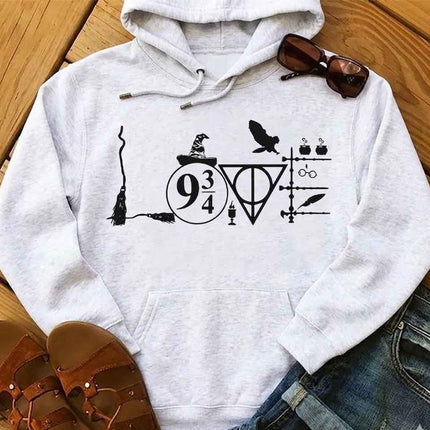 Hoodie Sorcier Tous tes symboles préférés en un seul look